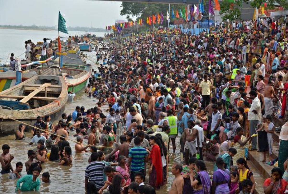 Lakhs of devotees converge for holy dip